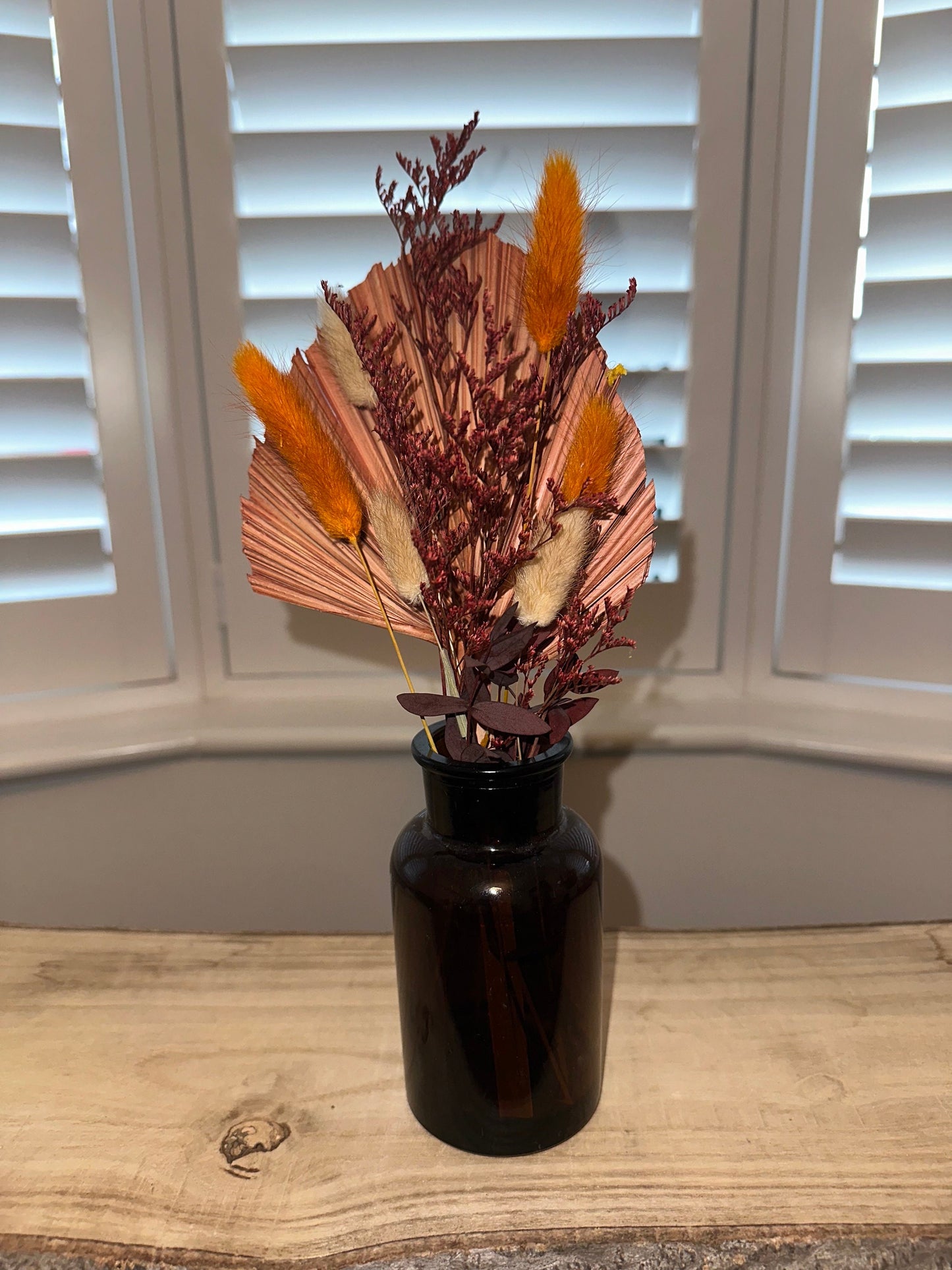 Mini dried floral arrangement with vase