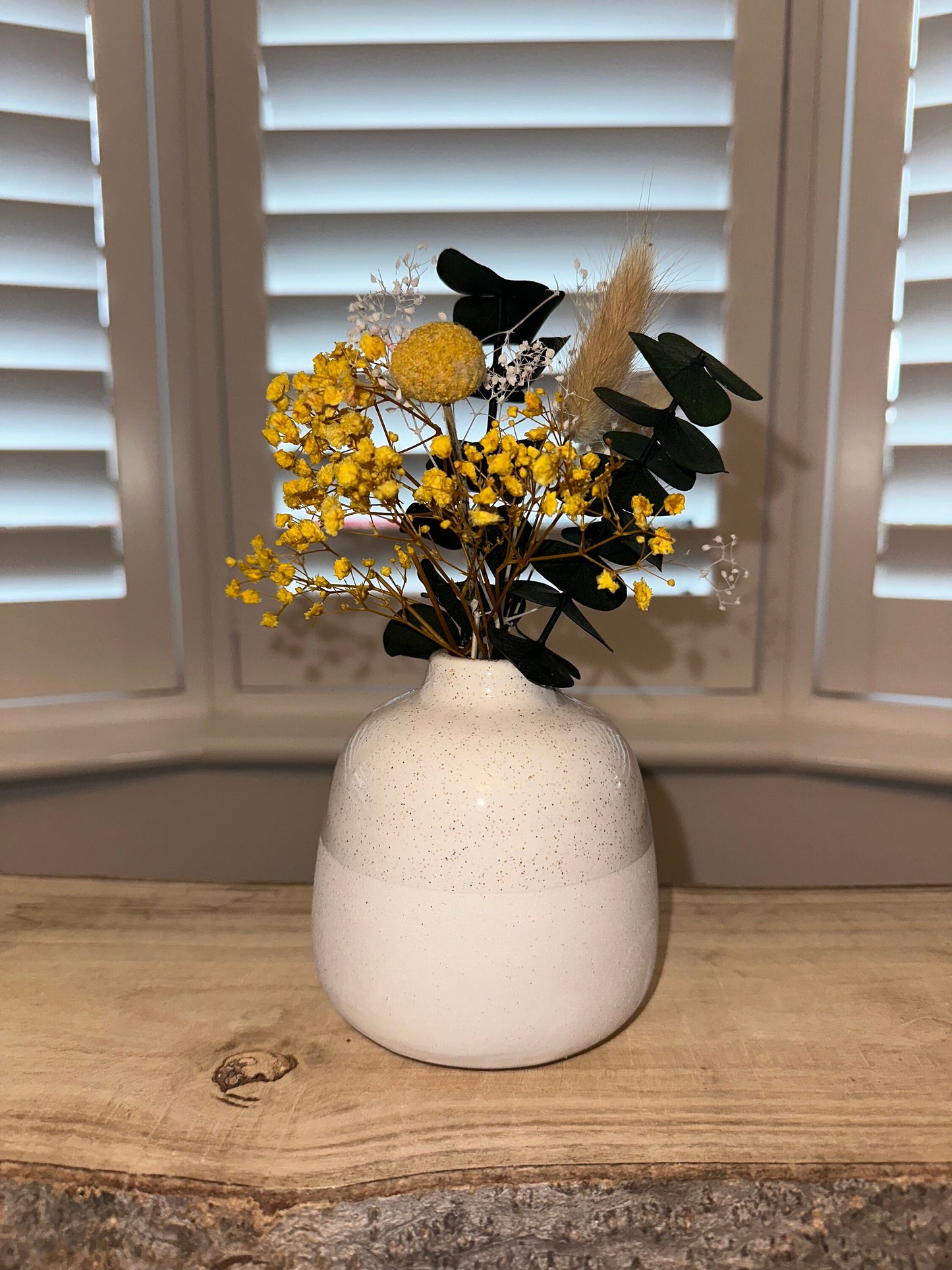 Mini dried floral arrangement with vase